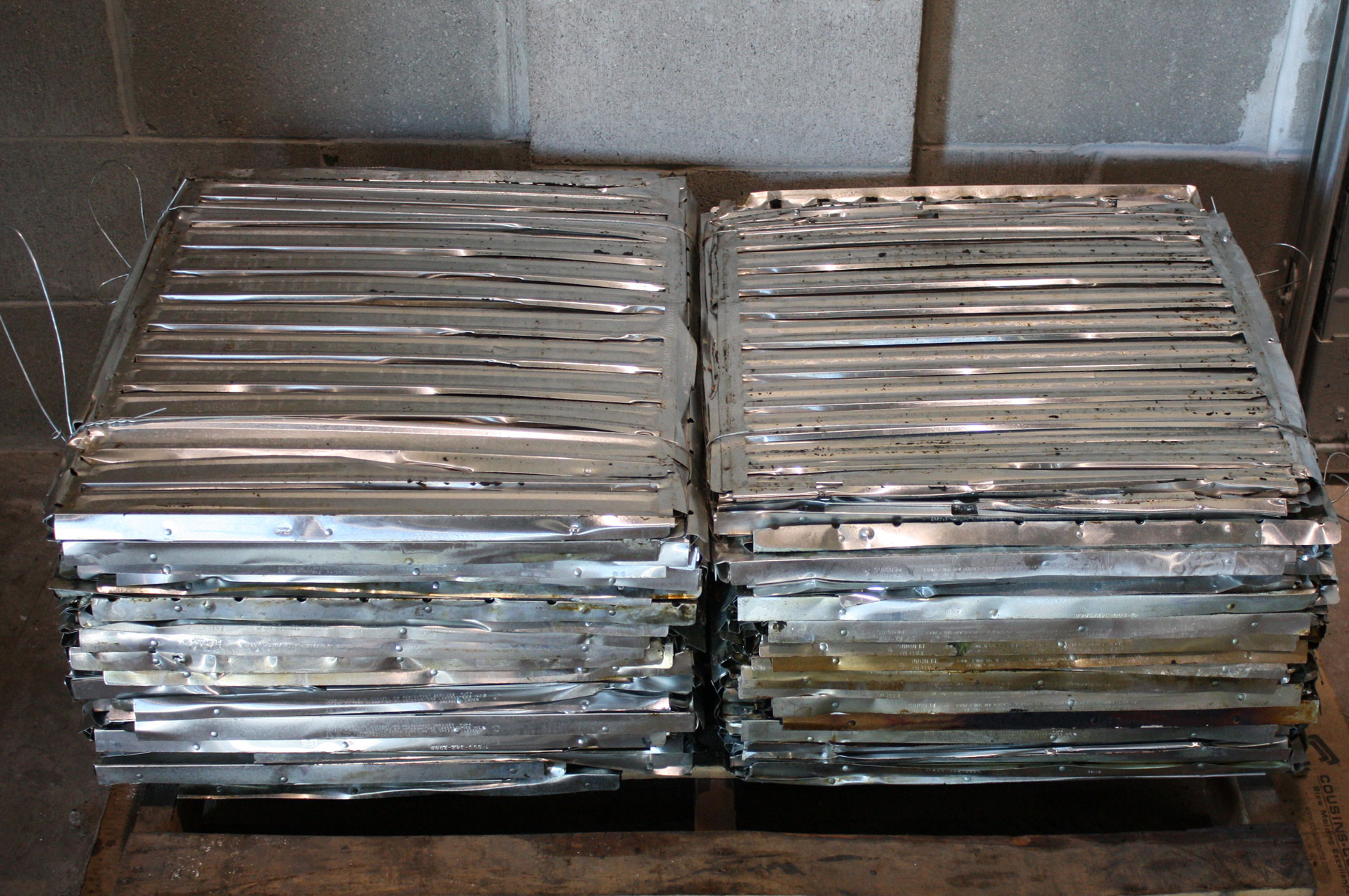 Crushed and recycled grease filters